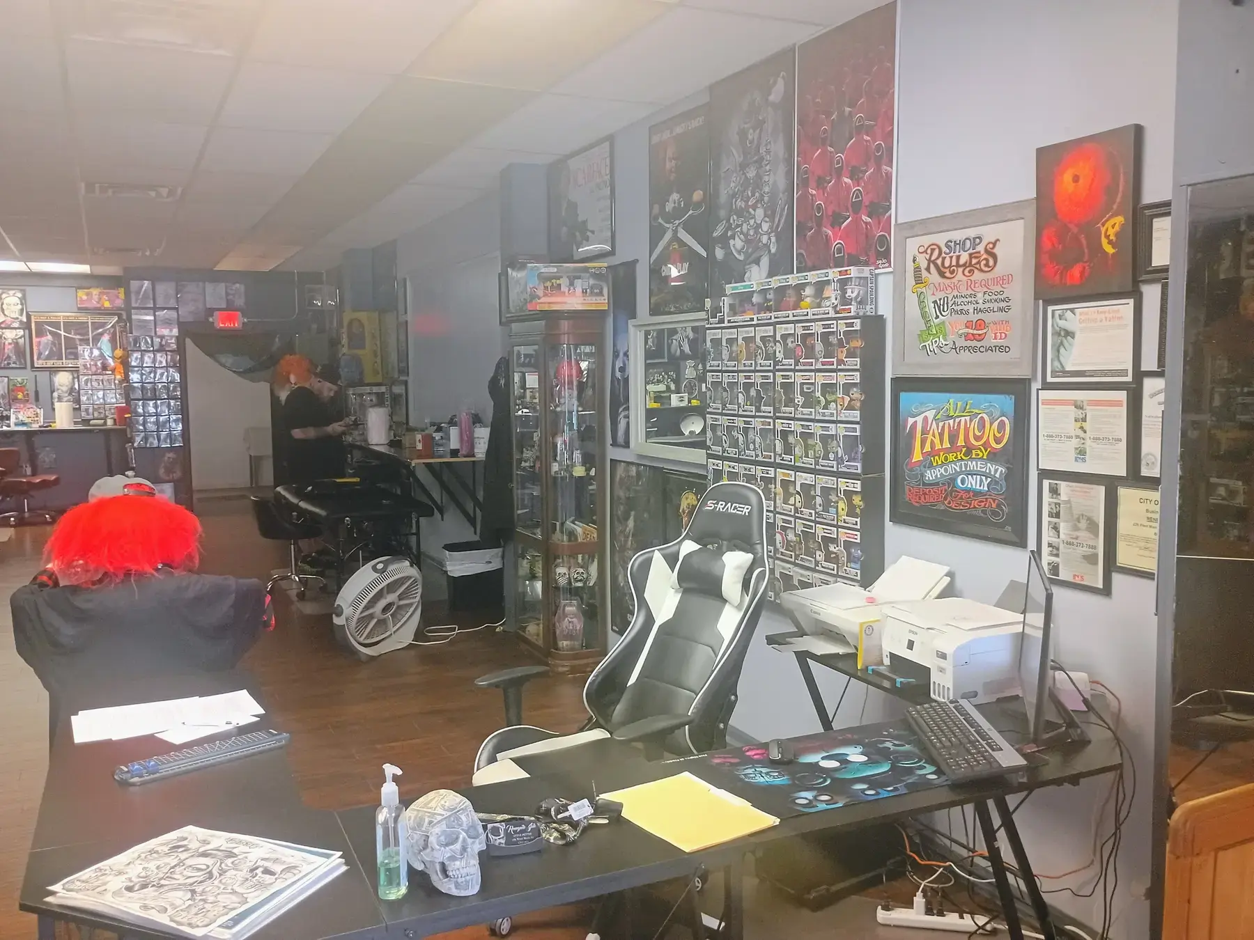 Rows of boxed collectible figures inside Renegade Ink