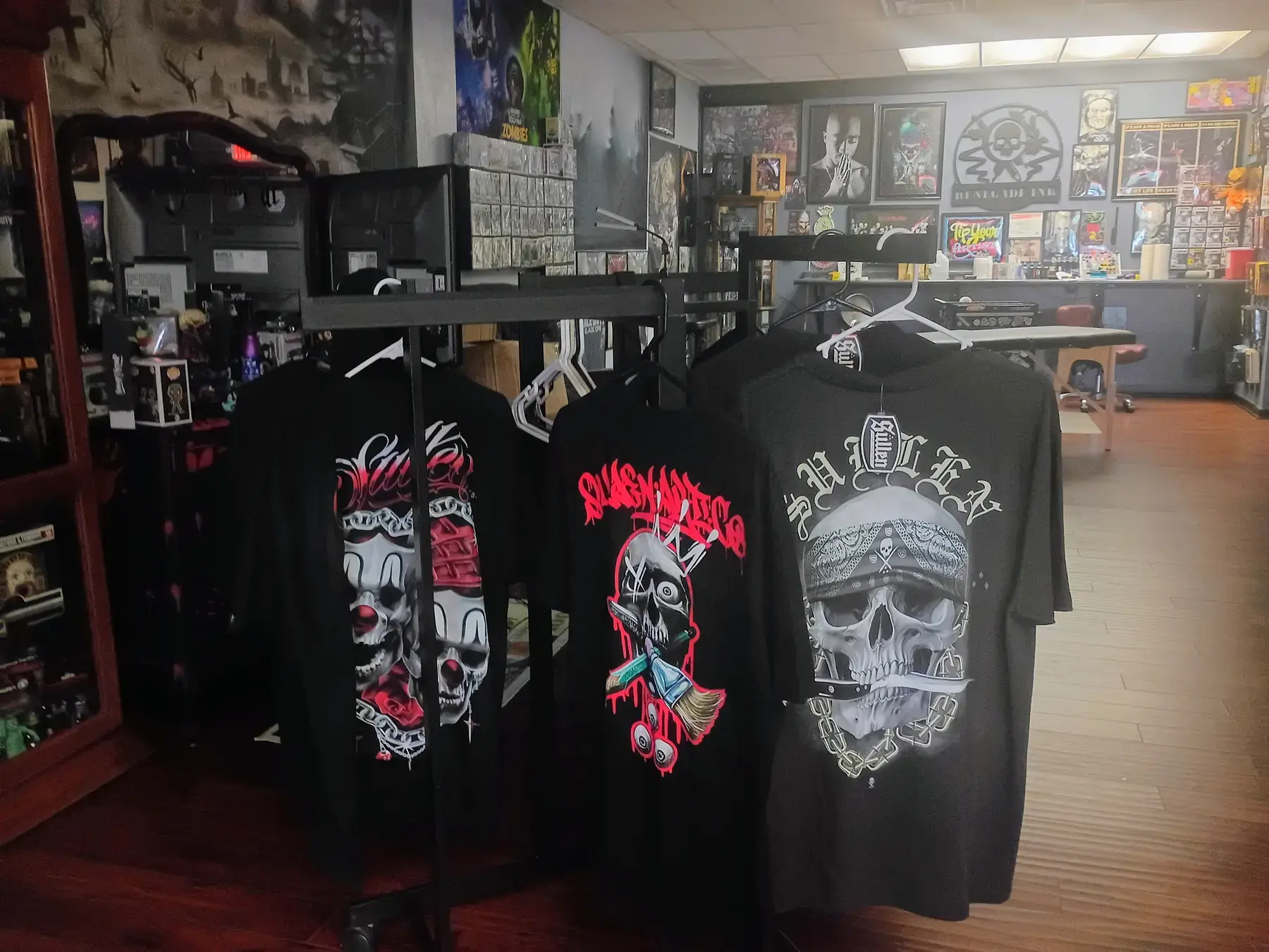 Renegade Ink shirts, artwork, and collectibles displayed inside the shop