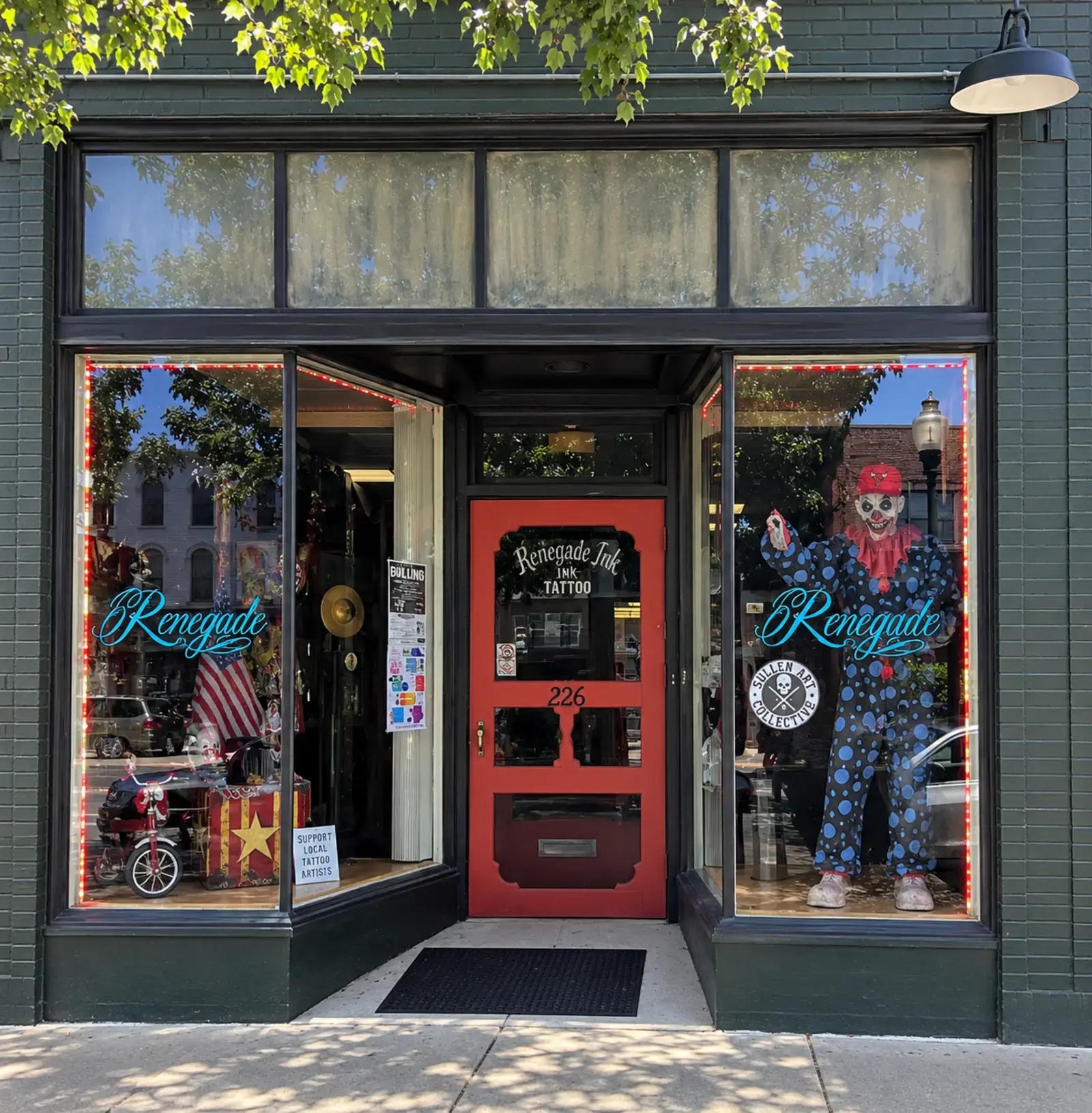 The black and red Renegade Ink storefront on Main Street in Ottawa, Illinois